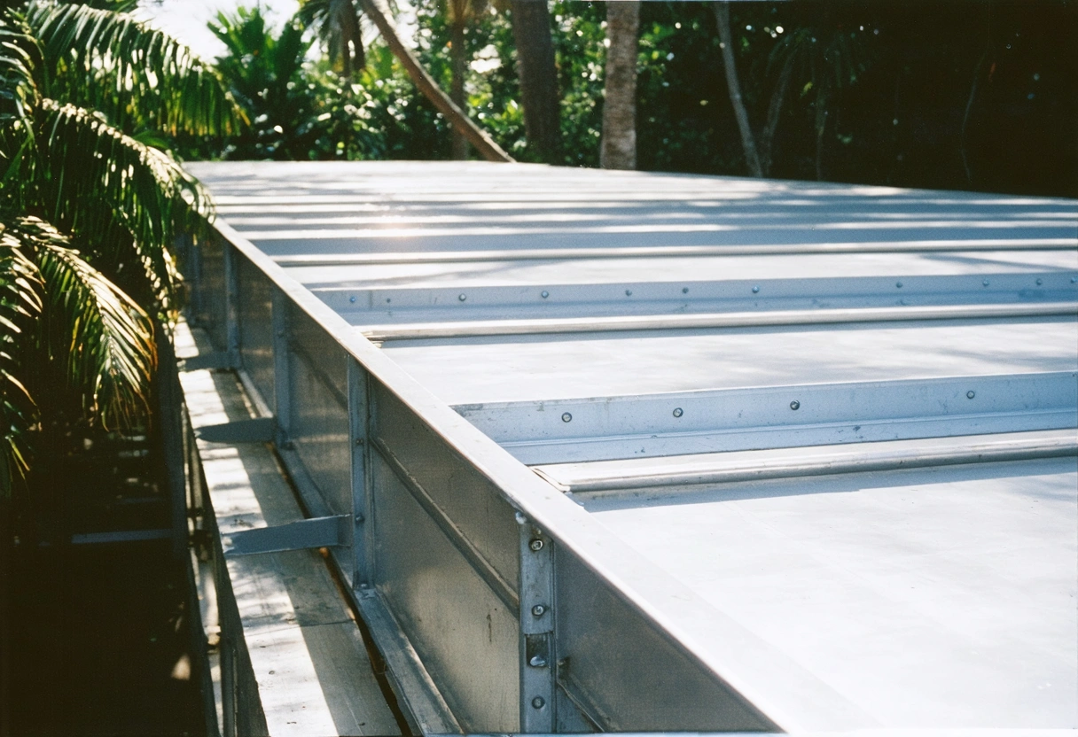 Closeup of reinforced aluminum beams and interlocking panels in a hurricane-rated patio enclosure